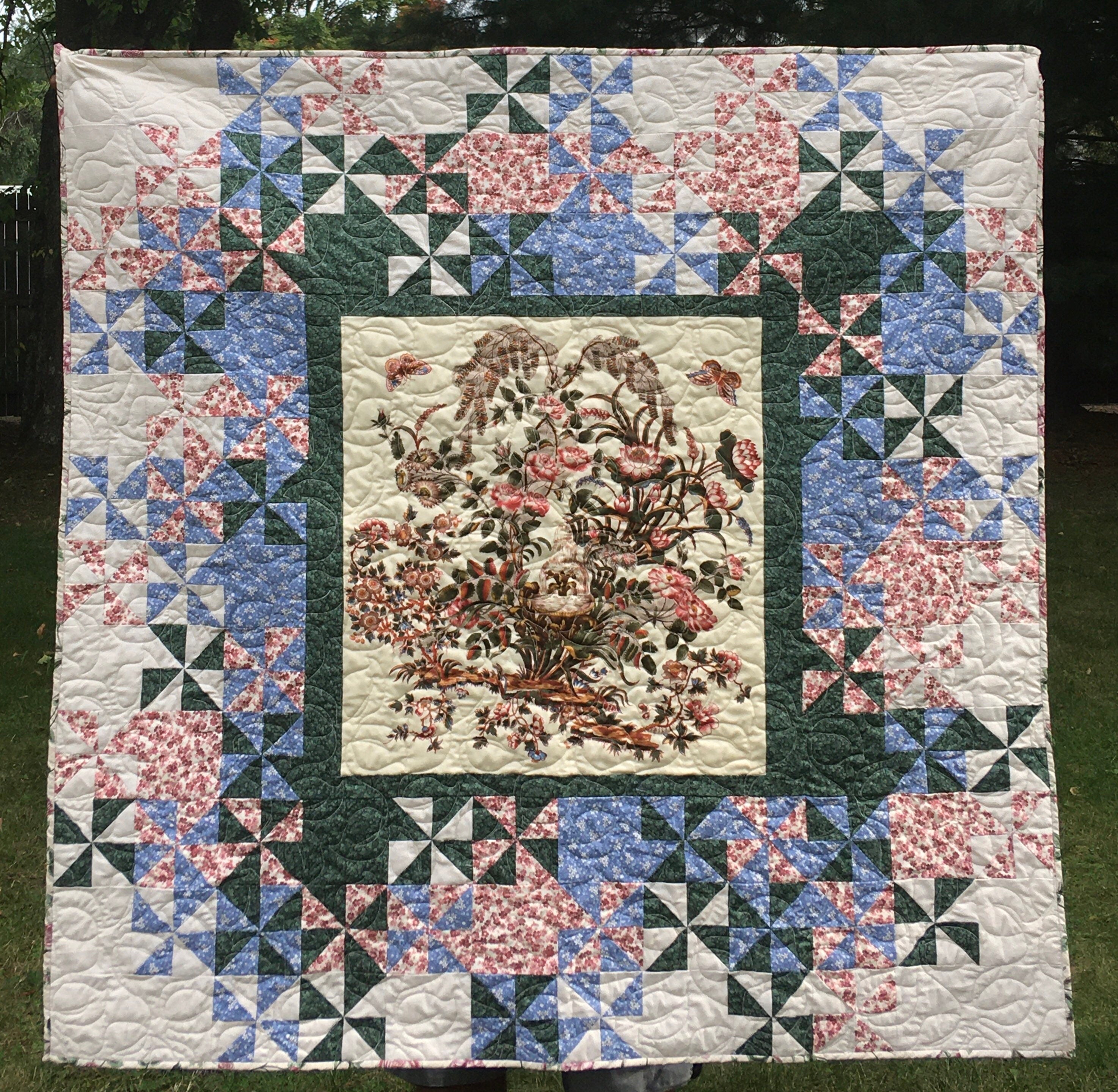 Floral, fountain panel lap quilt