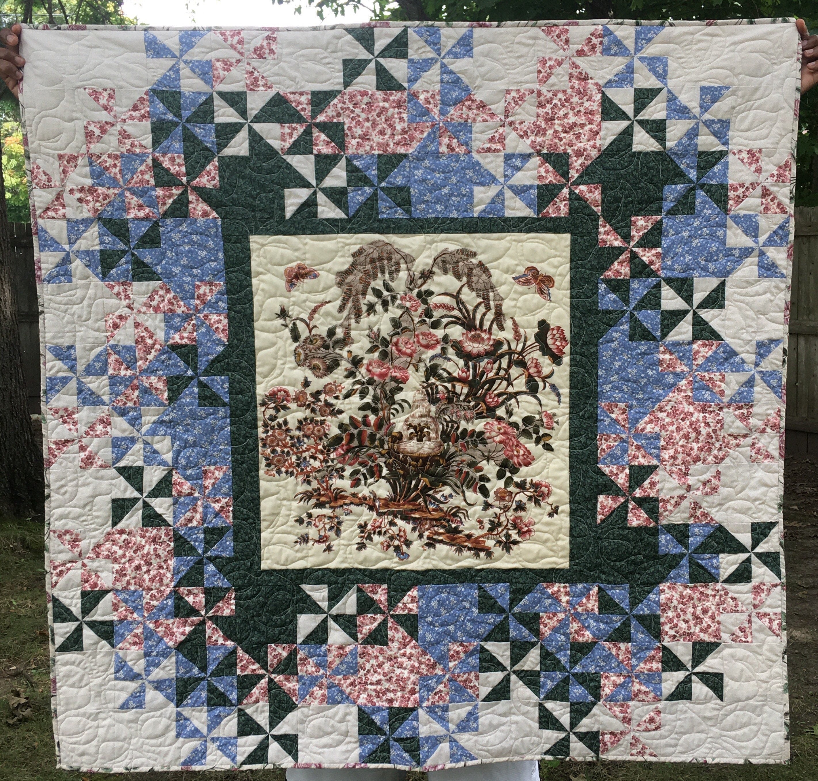 Floral, fountain panel lap quilt